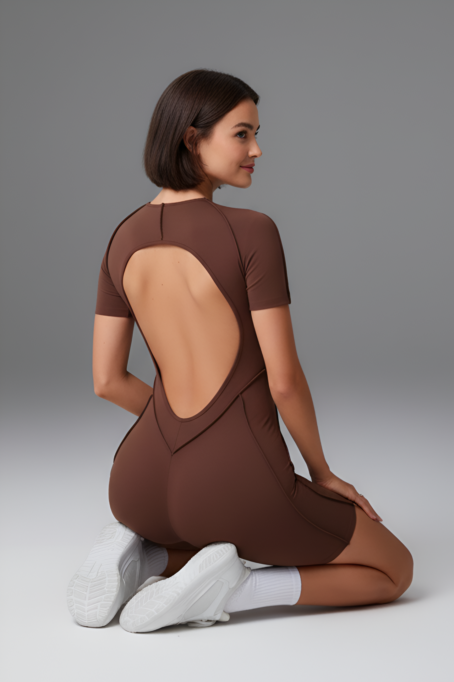 Corset-Detail Sculpting Mini Unitard | Open-Back Active Romper with Body Contouring